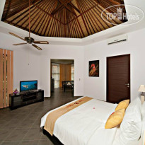 Discovery Candidasa Cottages and Villas Deluxe Cottage bedroom