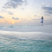 Baros Maldives Yoga on the Sandbank