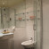 Krumers Post Hotel & Spa Ванная комната в джуниор съют 