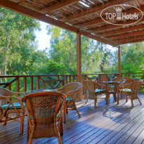 Apollonia Beach Resort & Spa Wood Veranda Lobby