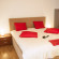 Casa Rosso Suites Hotel 