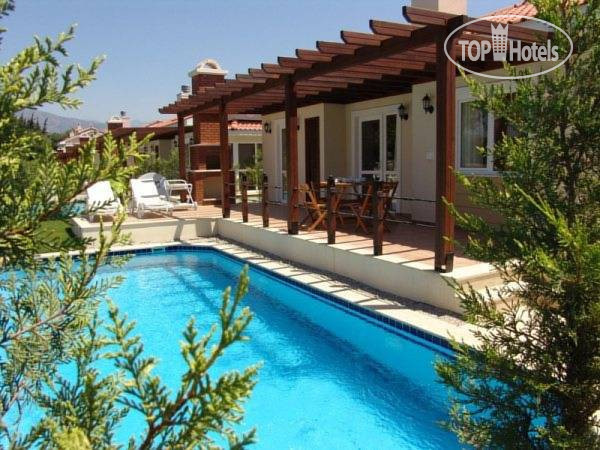 Фотографии отеля  Oasis Village Bungalows 