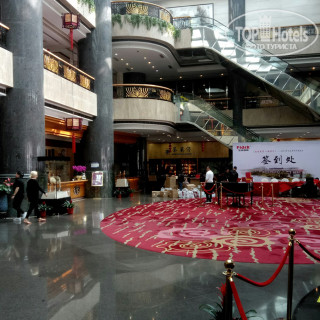 Фото отеля Guangzhou New Century Hotel 4*