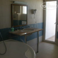Royal Calisto Hotel  Ванная комната апартамента бло