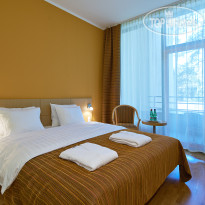 Amber Sea Hotel & Spa Sun Suite спальня