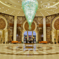 Triumph Luxury Hotel Холл