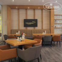 Triumph Luxury Hotel Oasis Cafe