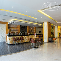 Triumph Luxury Hotel Oasis Cafe