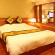 Hoang Hai Hotel Спальня номера VIP-класса