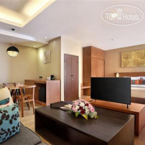 Golden Tulip Essential Denpasar Номер делюкс