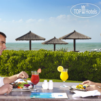 Coral Beach Resort Sharjah Ресторан Waves расположенный р