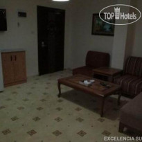 Excelencia Hotel Suites 