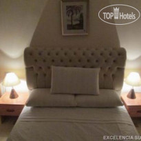 Excelencia Hotel Suites 