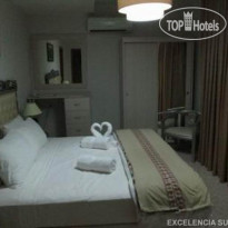 Excelencia Hotel Suites 