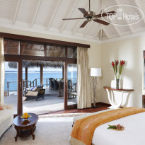 Taj Exotica Resort Rehendi Suite - спальня