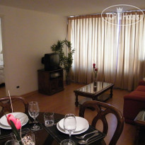 Providencia Suite Apartment Столовая в номере