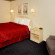Rodeway Inn & Suites Hwy 290 NW номер с 1 двуспальной кроватью