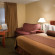 Club House Inn & Suites Standard King