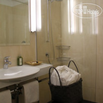 Krumers Post Hotel & Spa Ванная комната в номере "Альпи