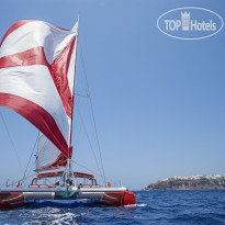 Canaves Oia Catamaran sailing