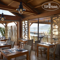 Roda Beach Resort & Spa 4* A la Carte Restaurant - Фото отеля
