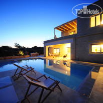 Aeriko Villa Outside patio and seating area