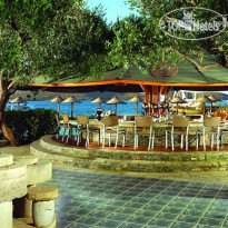 Porto Elounda Golf & SPA Resort Большой бар на пляже