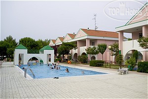 Фотографии отеля  Villaggio Ai Ginepri 5*