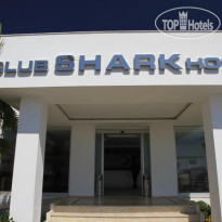 Shark Club Hotel Отель