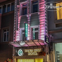 Walnut Shell Hotel Отель