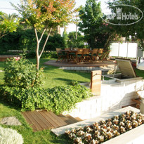 Parla Viens Suites Сад