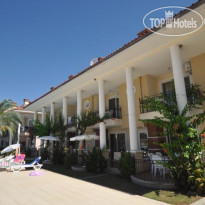 Oasis Village Hotel Отель