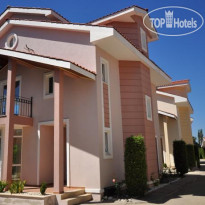 Oasis Village Hotel Отель