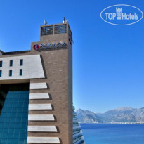 Ramada Plaza Antalya Здание отеля с Видом на Таврск