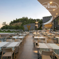 Mylome Luxury Hotel Resort Основной ресторан терасса