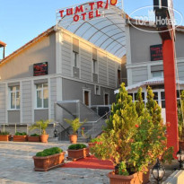 Tum Trio Hotel Отель