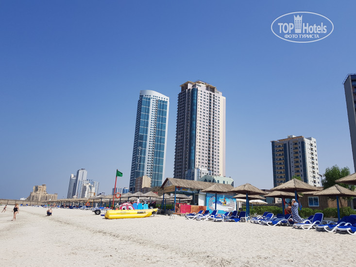 Рамада бич отель аджман. Ramada Beach Ajman 4. Рамада пляж. Рамада Бич отель Аджман 4 фото. Ramada Beach Ajman 96000.