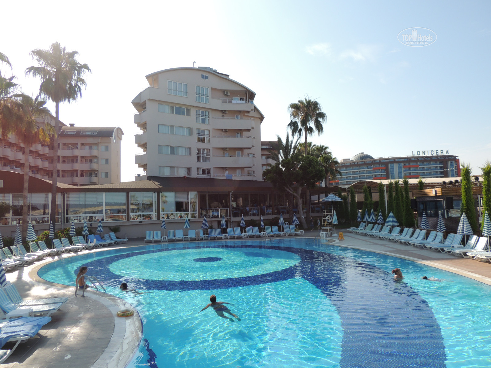 Отель турция lonicera premium. Lonicera world resort территория. Лонисера ворлд резорт 5 звезд турция. Лонисера отель. Лонисера резорт спа 5 турция аланья.
